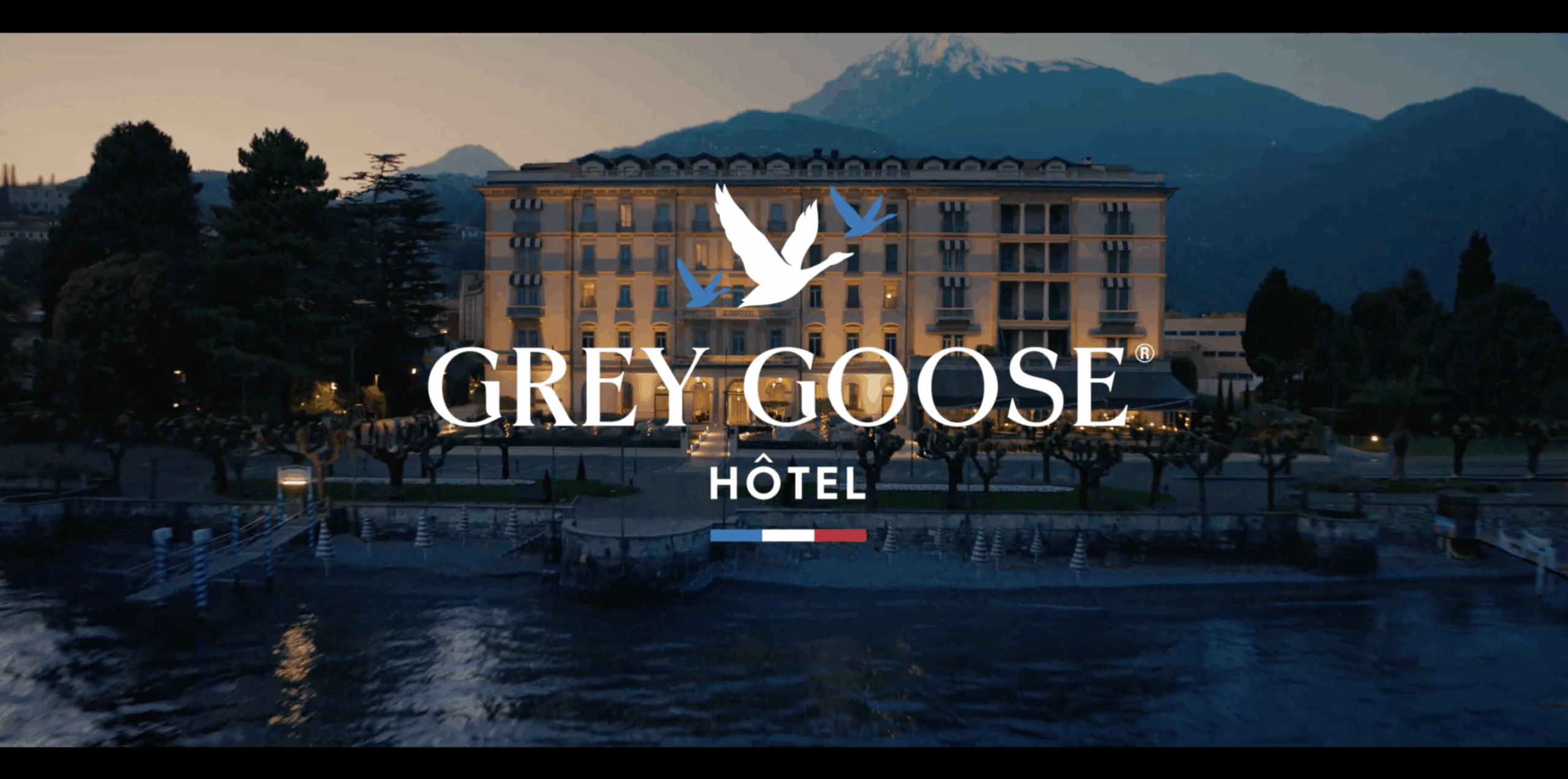 Screenshot from the "Lots O' Spots" campaign with a logo overlay of the Grey Goose Hotel logo